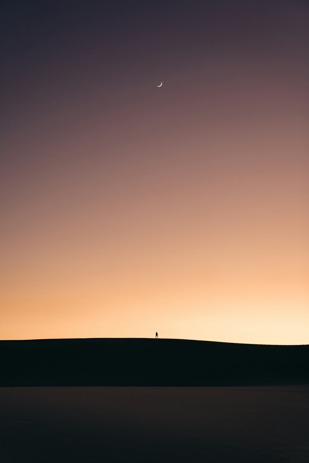 silhouette of mountain during sunset