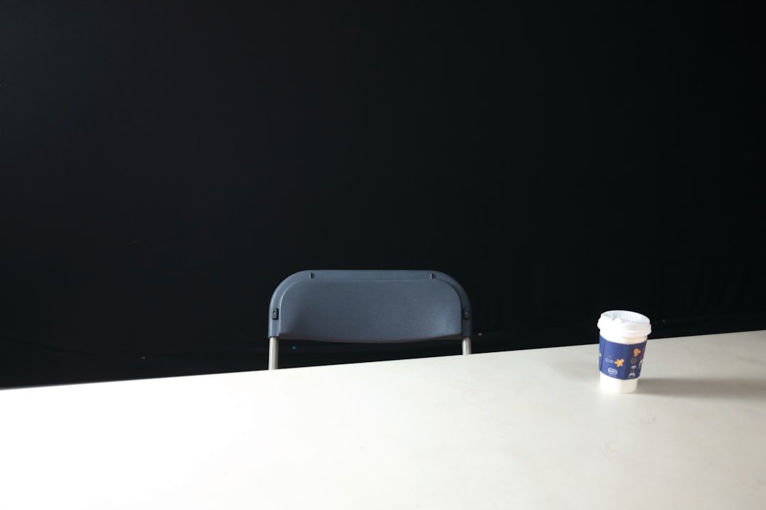 a chair and a cup of coffee on a table