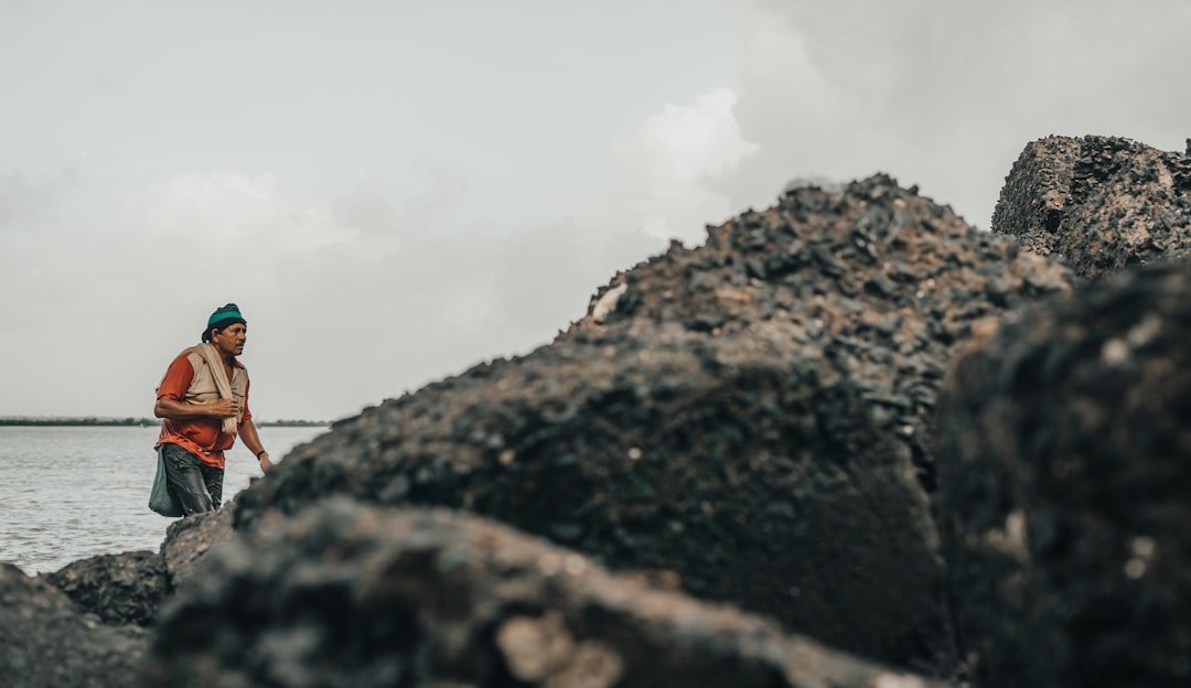 a man standing on a rock