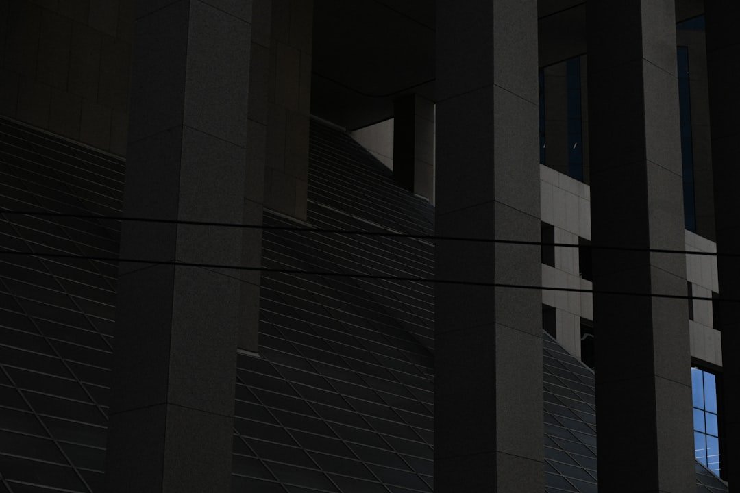 a clock on the side of a building at night