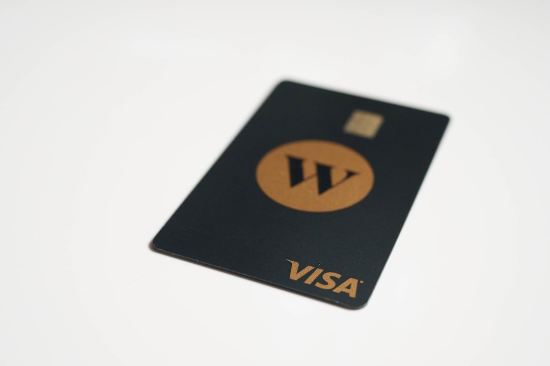 a visa card sitting on top of a white table