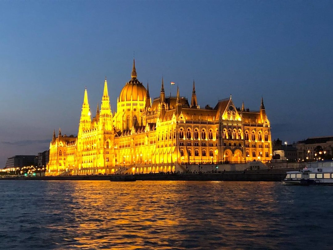 a large building sitting on top of a body of water